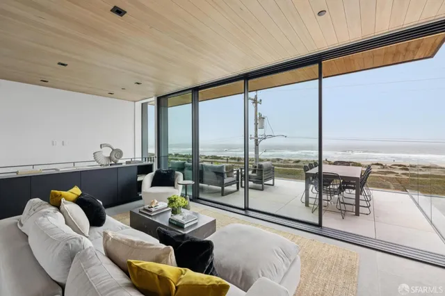 a kitchen with stainless steel appliances granite countertop a stove and a refrigerator