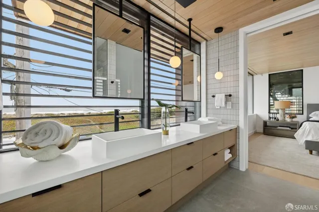 a bedroom with a bed and lamp