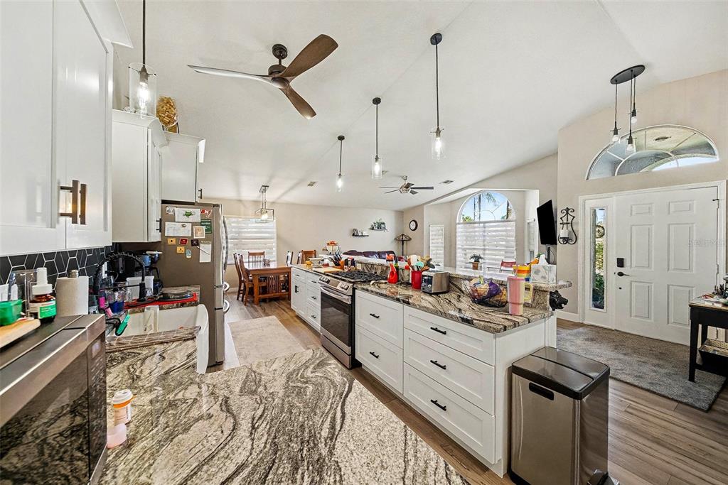 13749 Meade Court Hudson, FL 34667 - Photo 14 of 33 a view of a kitchen and dining room