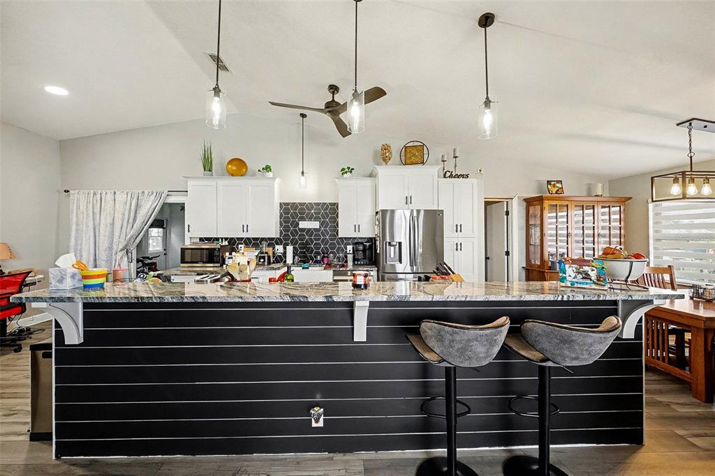 13749 Meade Court Hudson, FL 34667 - Photo 17 of 33 a kitchen with sink and stove