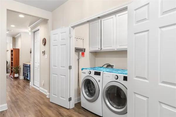 a view of hallway with washer and dryer