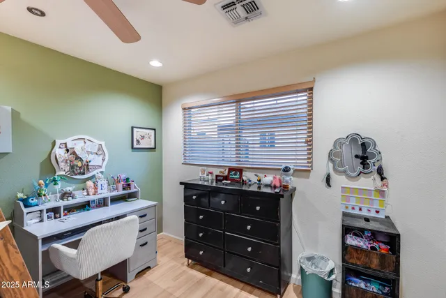 a view of swimming pool with a patio