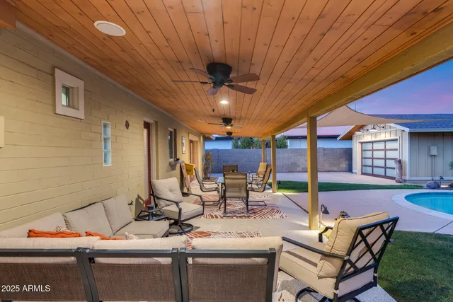 a view of a swimming pool with a lounge chairs