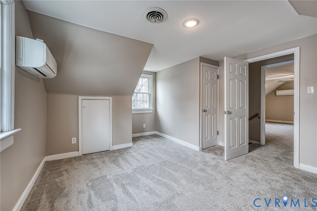 1221 Santa Anna Road Henrico, VA 23229 - Photo 21 of 26 Bonus room with vaulted ceiling, light carpet, and
