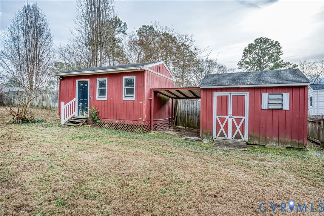1221 Santa Anna Road Henrico, VA 23229 - Photo 23 of 26 View of shed with a fenced backyard