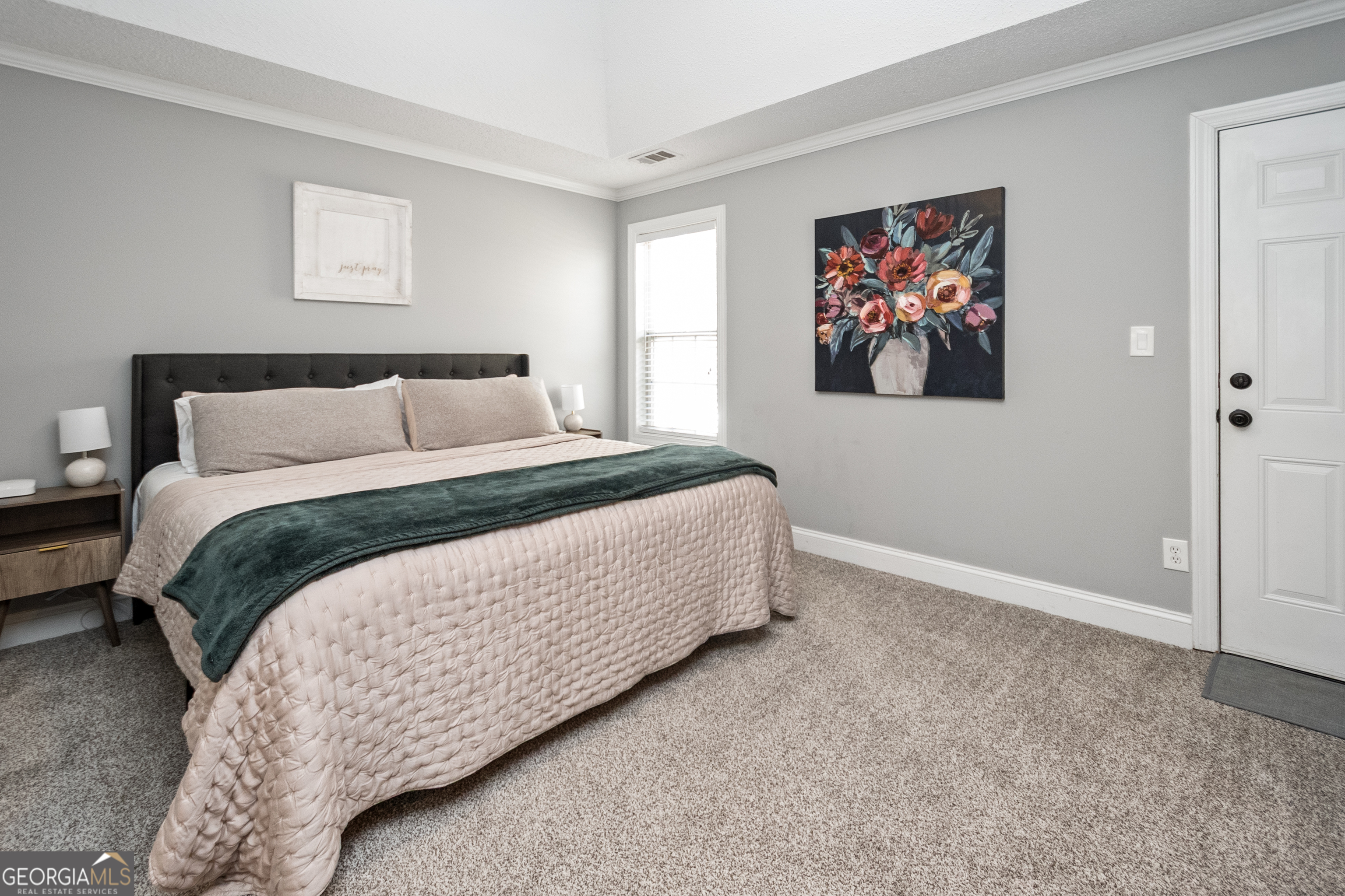 568 Martin Mill Road Moreland, GA 30259 - Photo 20 of 70 a bedroom with bed and wall painting