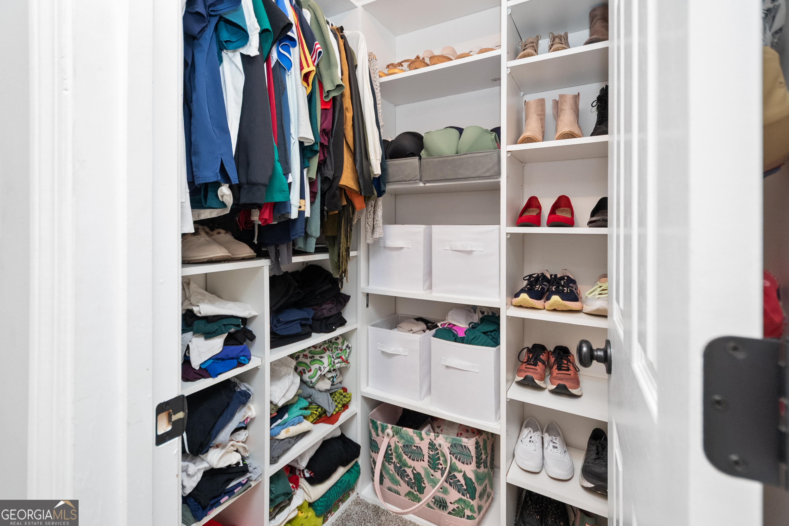 568 Martin Mill Road Moreland, GA 30259 - Photo 23 of 70 a room with a book shelf and a closet