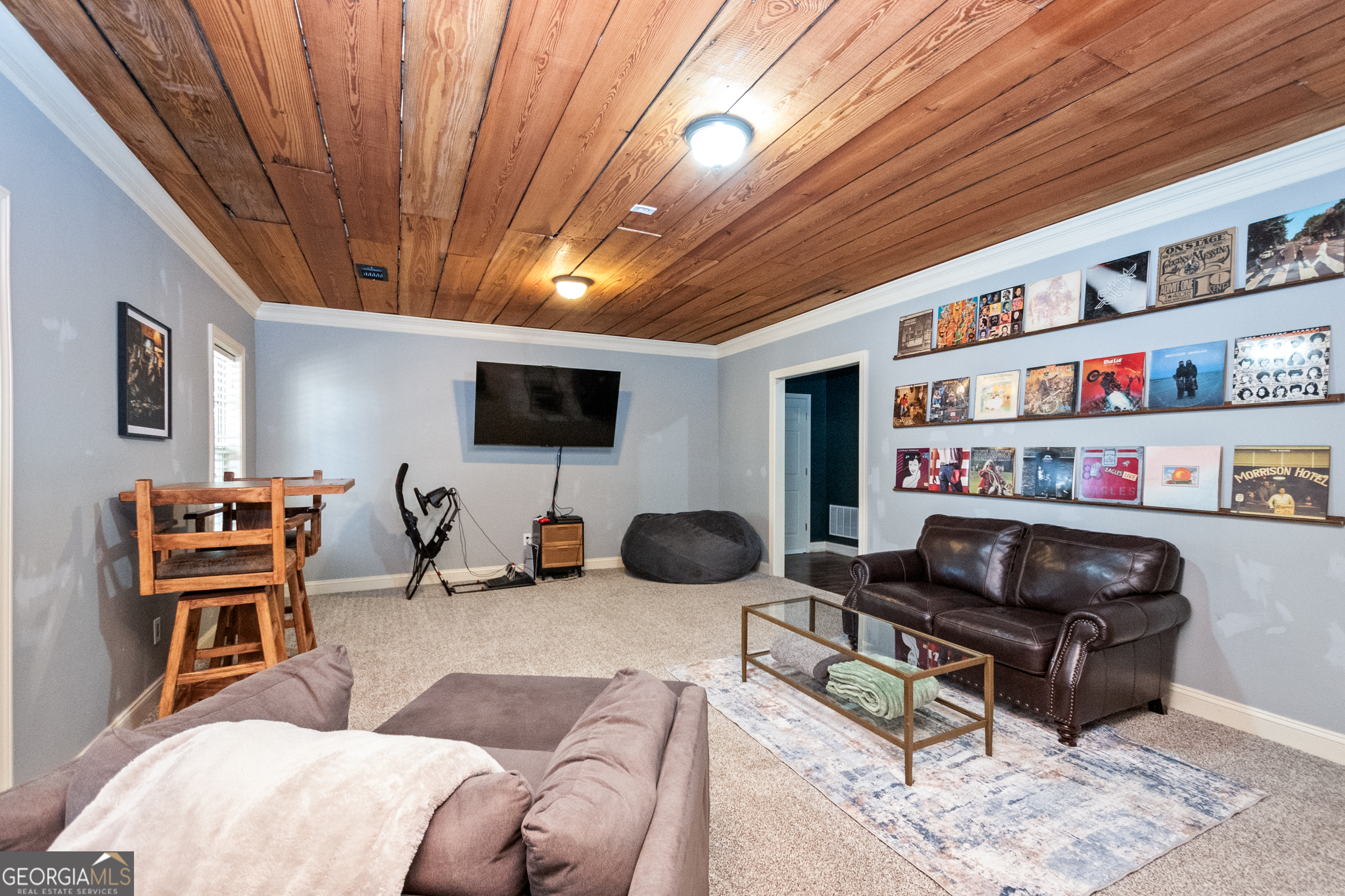 568 Martin Mill Road Moreland, GA 30259 - Photo 43 of 70 a bedroom with furniture and a flat screen tv