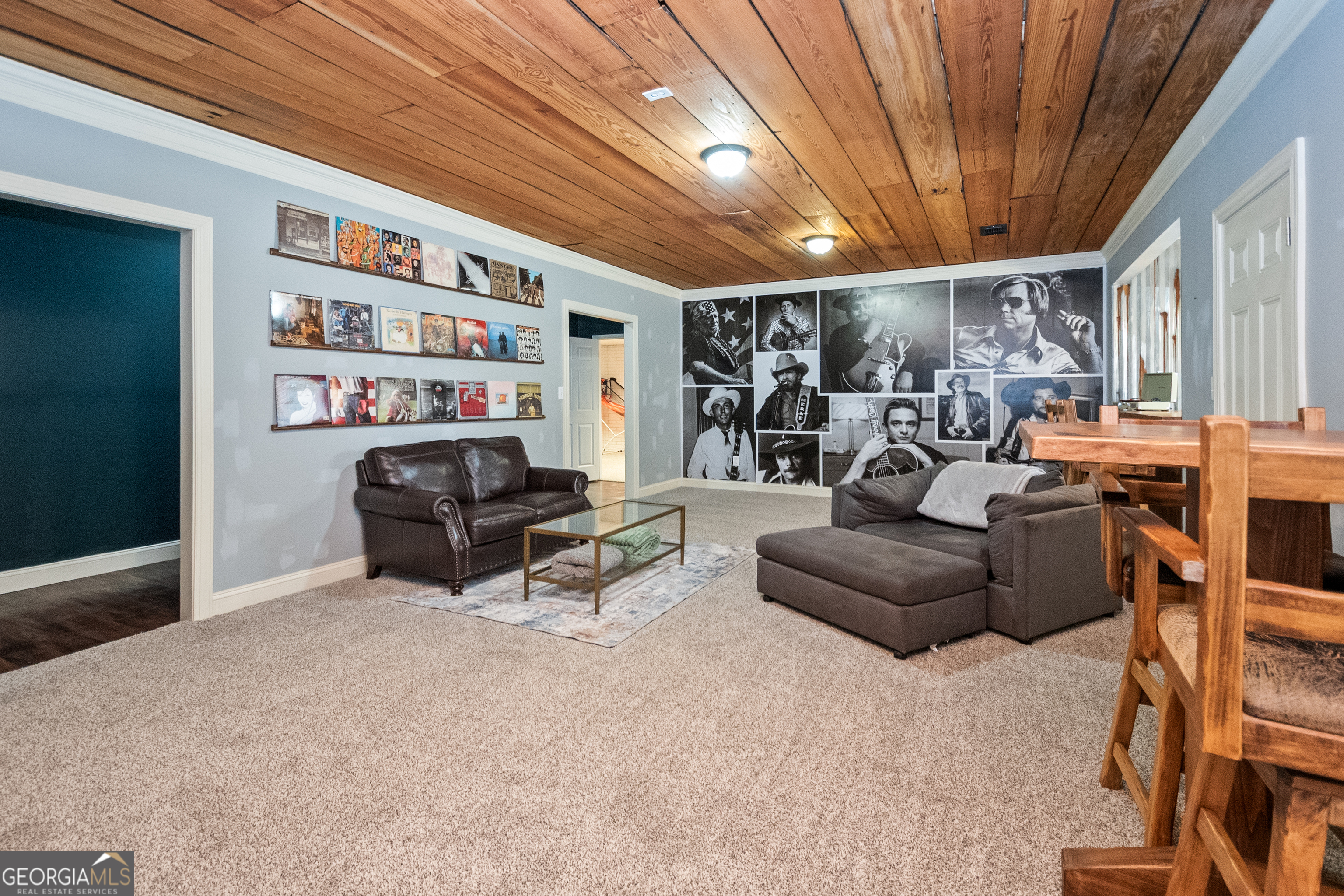568 Martin Mill Road Moreland, GA 30259 - Photo 45 of 70 a living room with furniture a ceiling fan and a rug