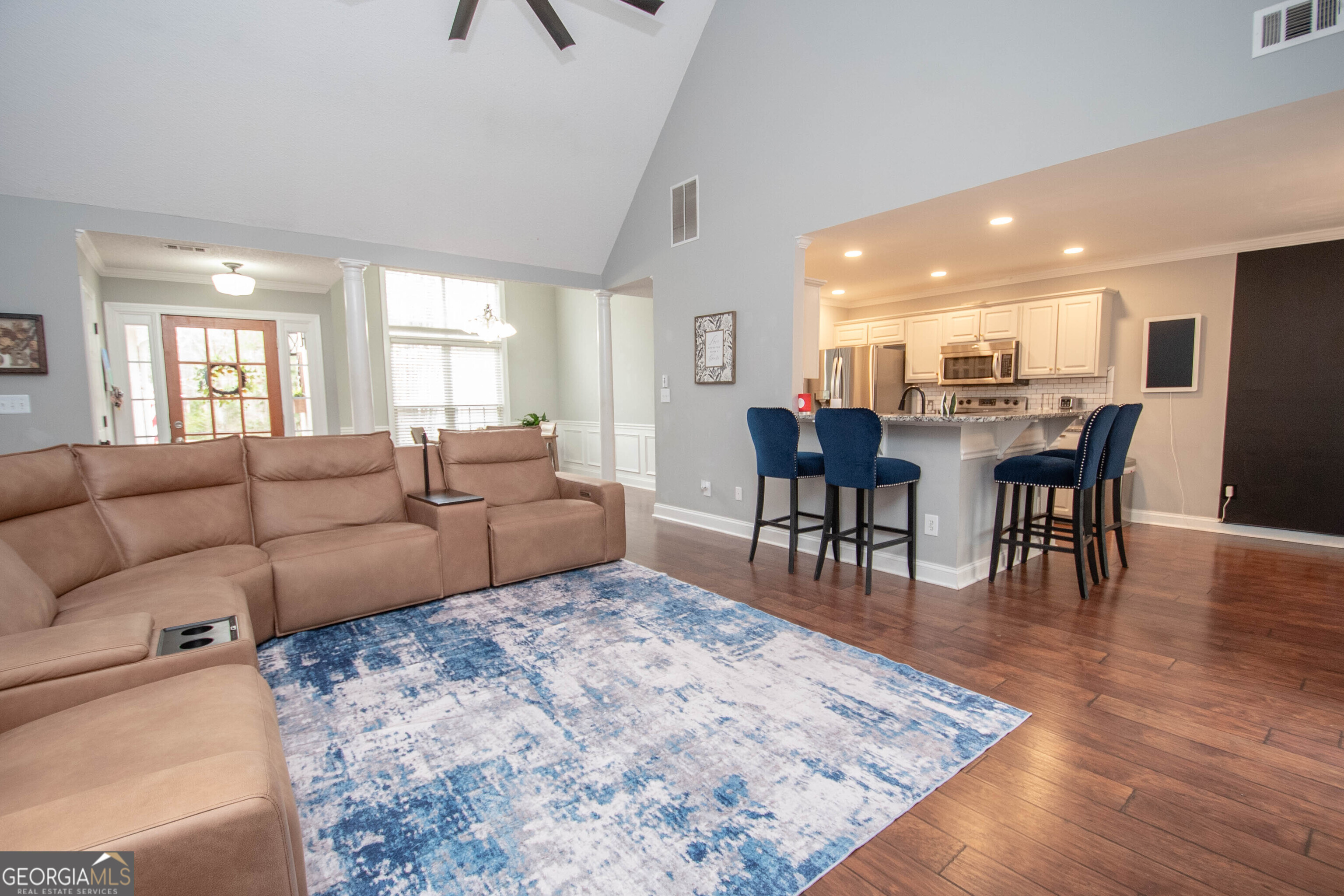 568 Martin Mill Road Moreland, GA 30259 - Photo 7 of 70 a living room with furniture a dining table and a large window