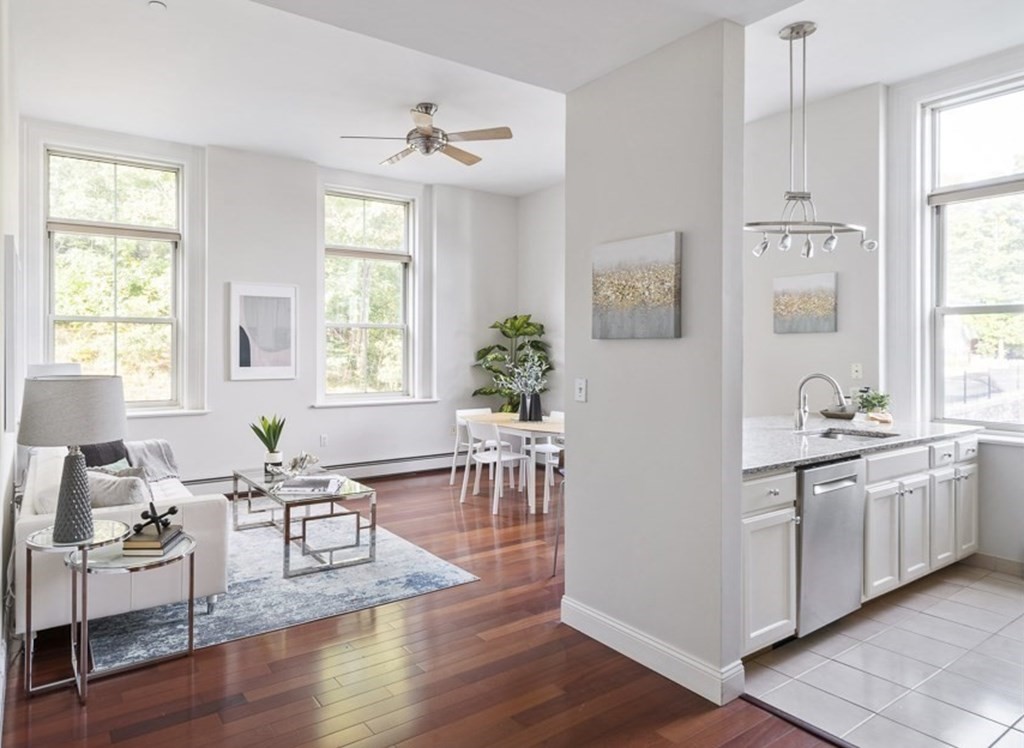 145 Glenwood Street, Unit 204 Malden, MA 02148 - Photo 4 of 13 a living room with furniture window and wooden floor