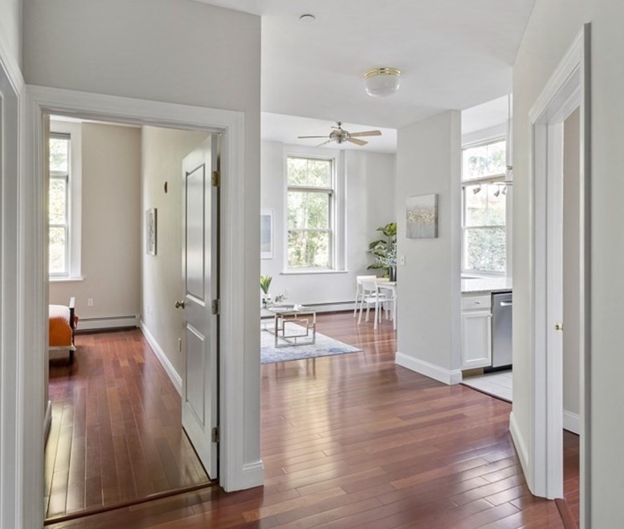 145 Glenwood Street, Unit 204 Malden, MA 02148 - Photo 7 of 13 a view of a living room and hardwood floor