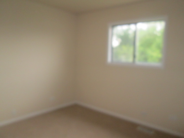 3055 Timber Hill Lane Aurora, IL 60504 - Photo 12 of 23 a view of an empty room and window