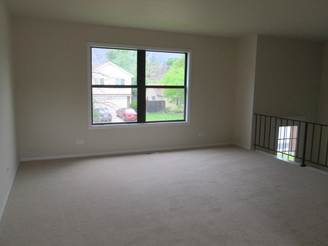 3055 Timber Hill Lane Aurora, IL 60504 - Photo 4 of 23 an empty room with a window