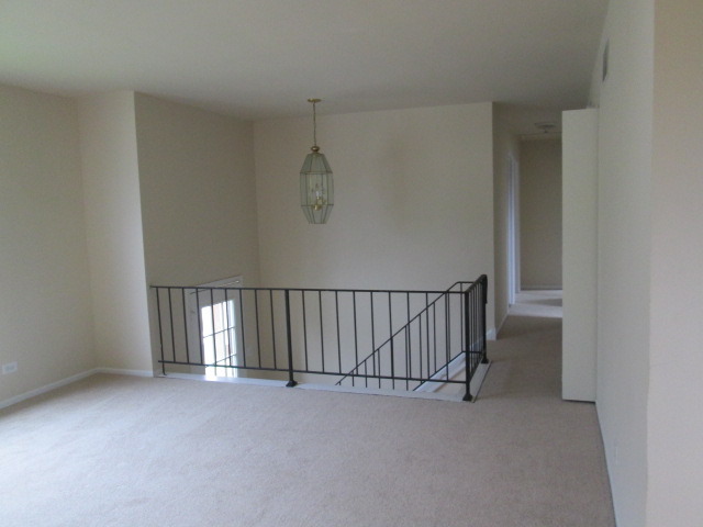 3055 Timber Hill Lane Aurora, IL 60504 - Photo 5 of 23 a view of a livingroom with a staircase