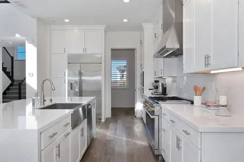 a view of a room with rack on the wall and a window