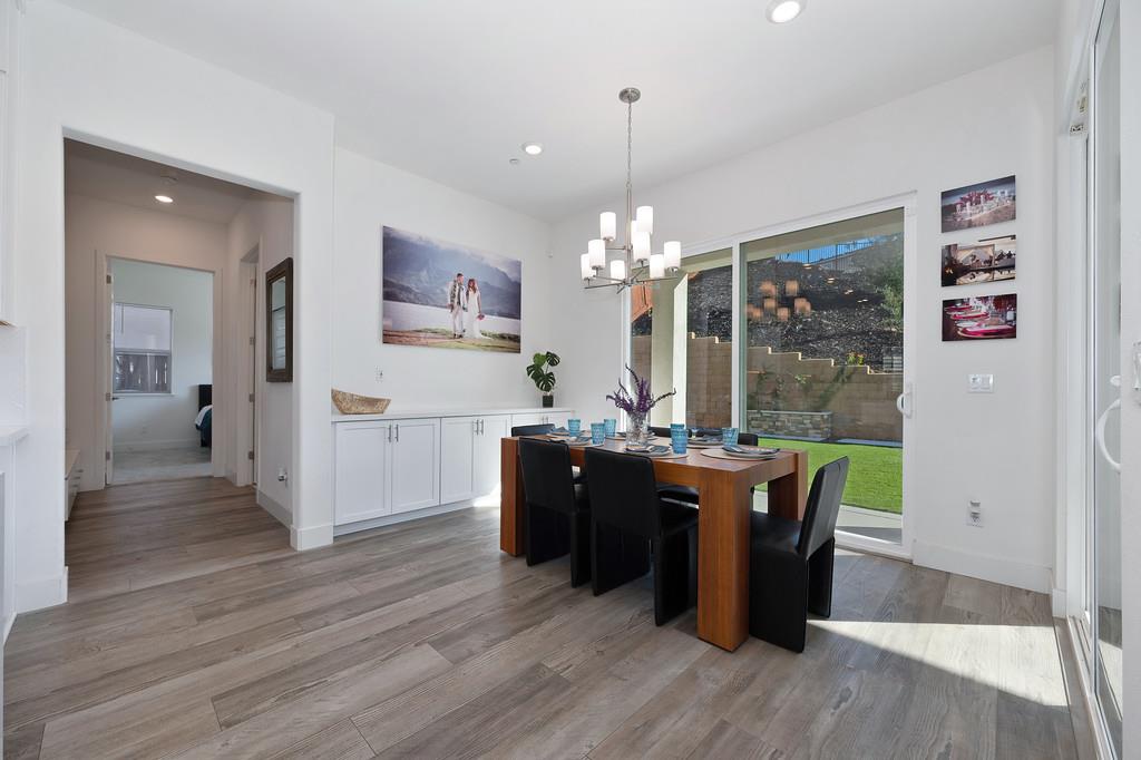 3063 Sherman Way El Dorado Hills, CA 95762 - Photo 24 of 75 a view of a dining room with furniture window and wooden floor