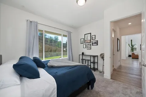 a utility room with sink dryer and washer