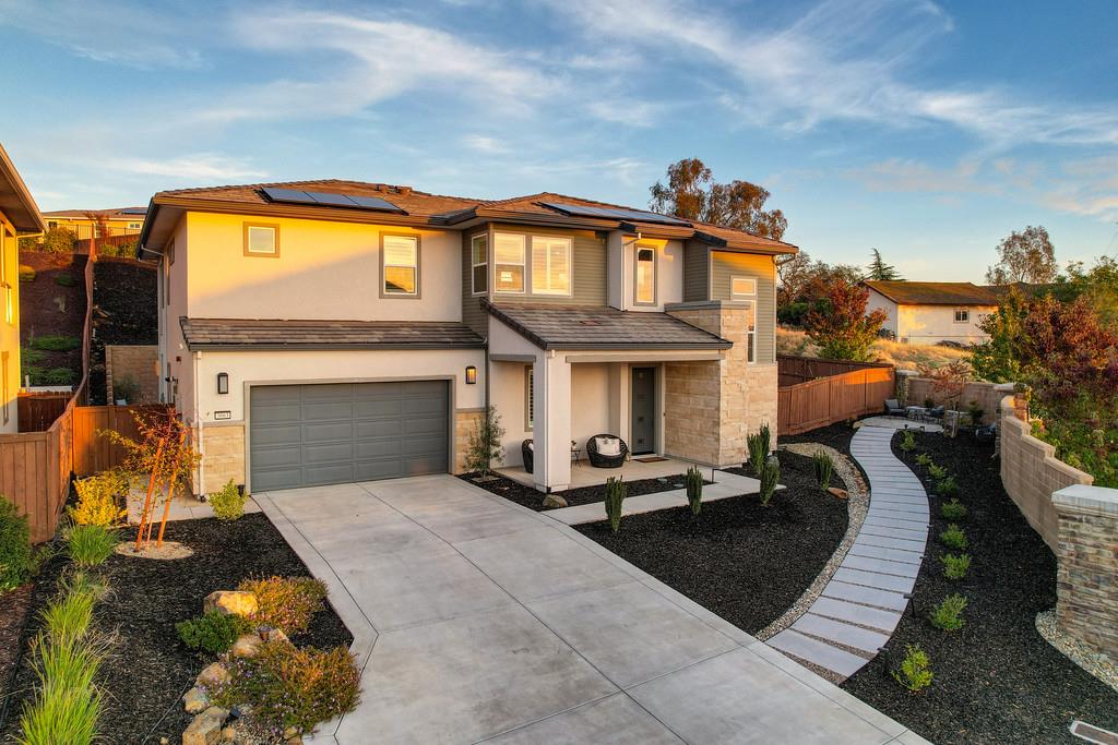 3063 Sherman Way El Dorado Hills, CA 95762 - Photo 3 of 75 a view of a swimming pool with couches chairs and a fire pit