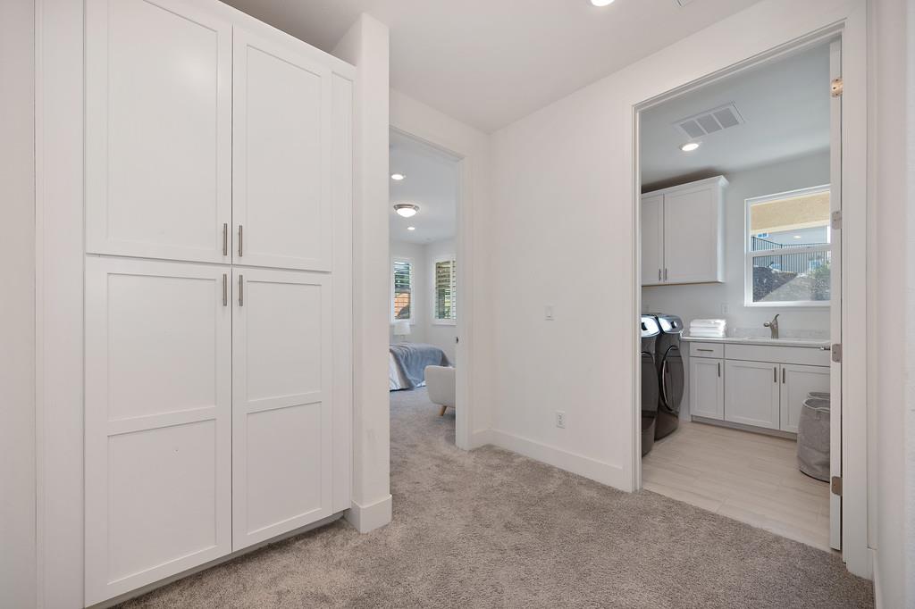 3063 Sherman Way El Dorado Hills, CA 95762 - Photo 37 of 75 a view of a storage & utility room with closet dryer