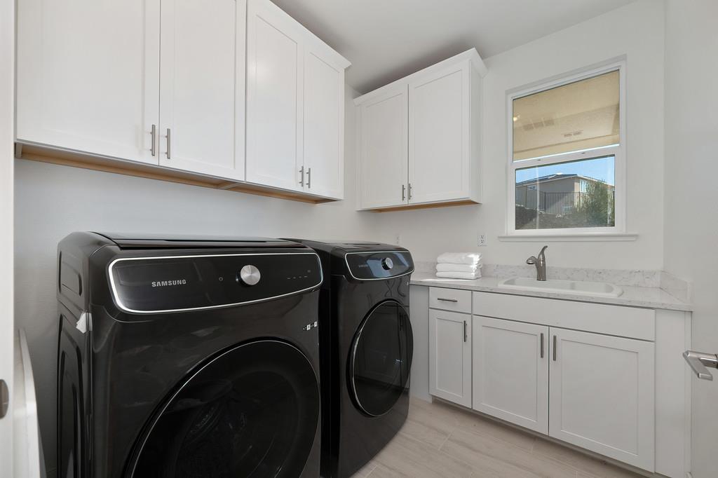 3063 Sherman Way El Dorado Hills, CA 95762 - Photo 38 of 75 a utility room with sink dryer and washer