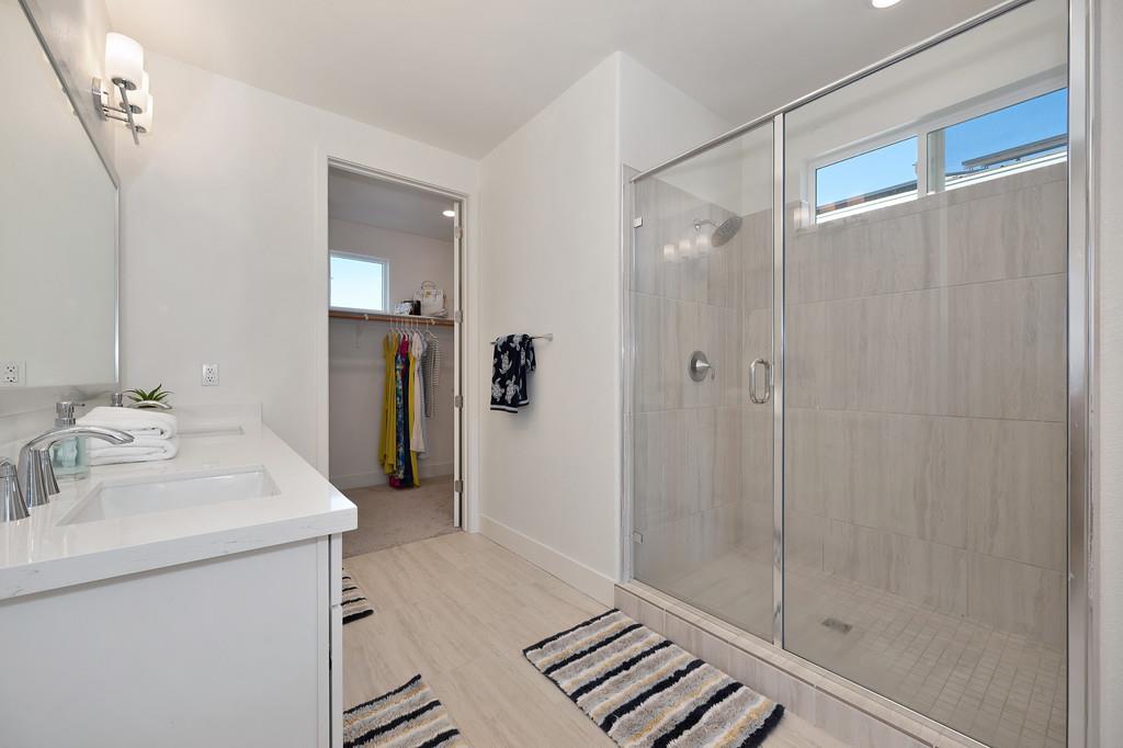 3063 Sherman Way El Dorado Hills, CA 95762 - Photo 43 of 75 a bathroom with a sink mirror and shower