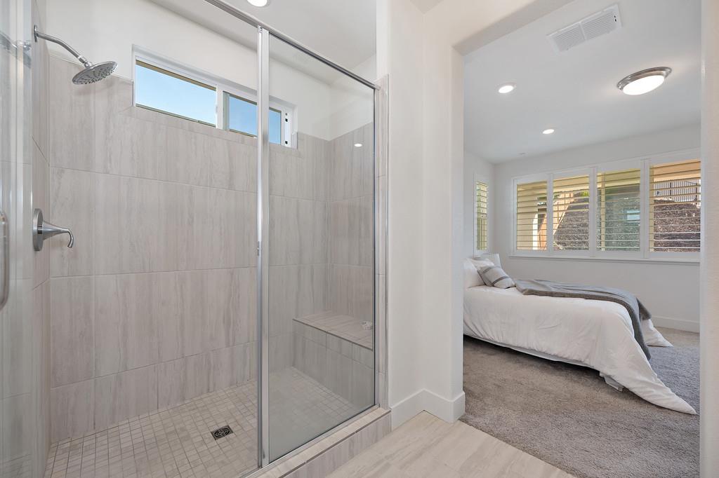 3063 Sherman Way El Dorado Hills, CA 95762 - Photo 44 of 75 a spacious bedroom with a bed and a window