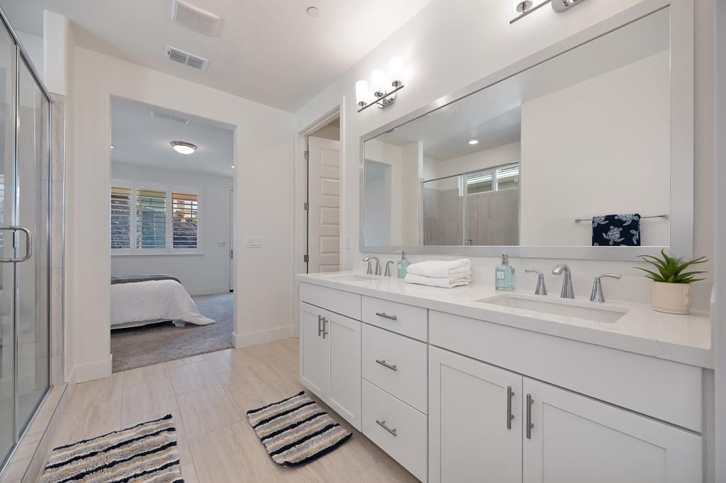 3063 Sherman Way El Dorado Hills, CA 95762 - Photo 45 of 75 a en suite bathroom with a sink double vanity