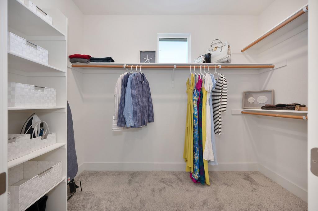 3063 Sherman Way El Dorado Hills, CA 95762 - Photo 46 of 75 a view of walk in closet with clothes and shoes
