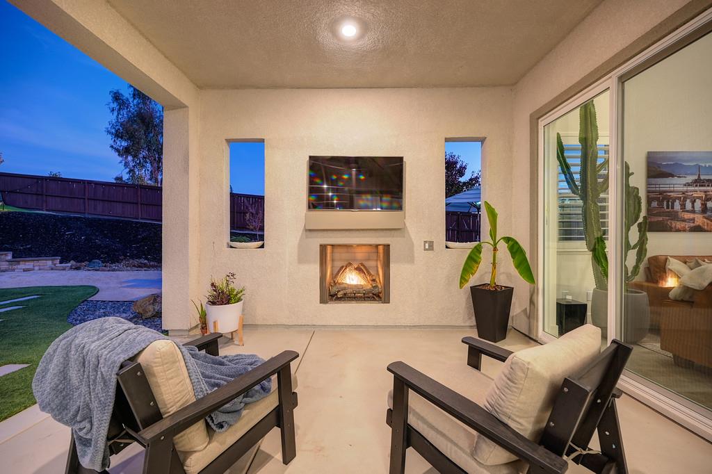 3063 Sherman Way El Dorado Hills, CA 95762 - Photo 71 of 75 a living room with furniture and a fireplace