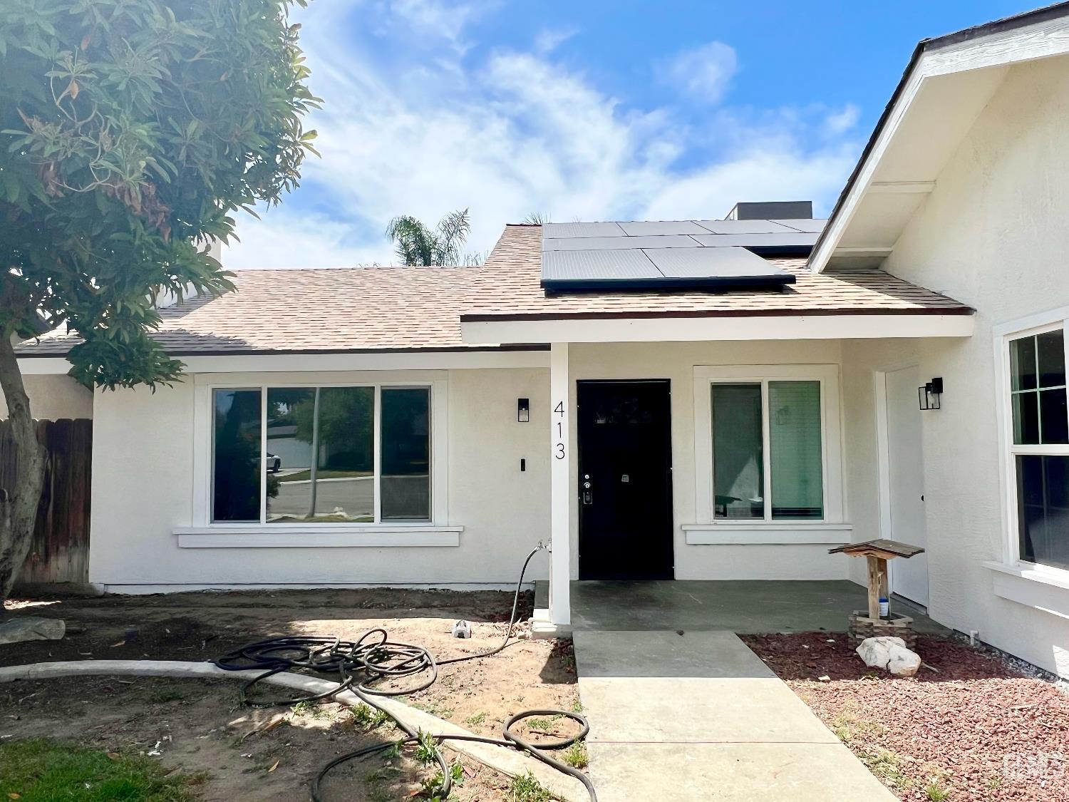 Undisclosed Address Bakersfield, CA 93308 - Photo 2 of 23 a front view of a house