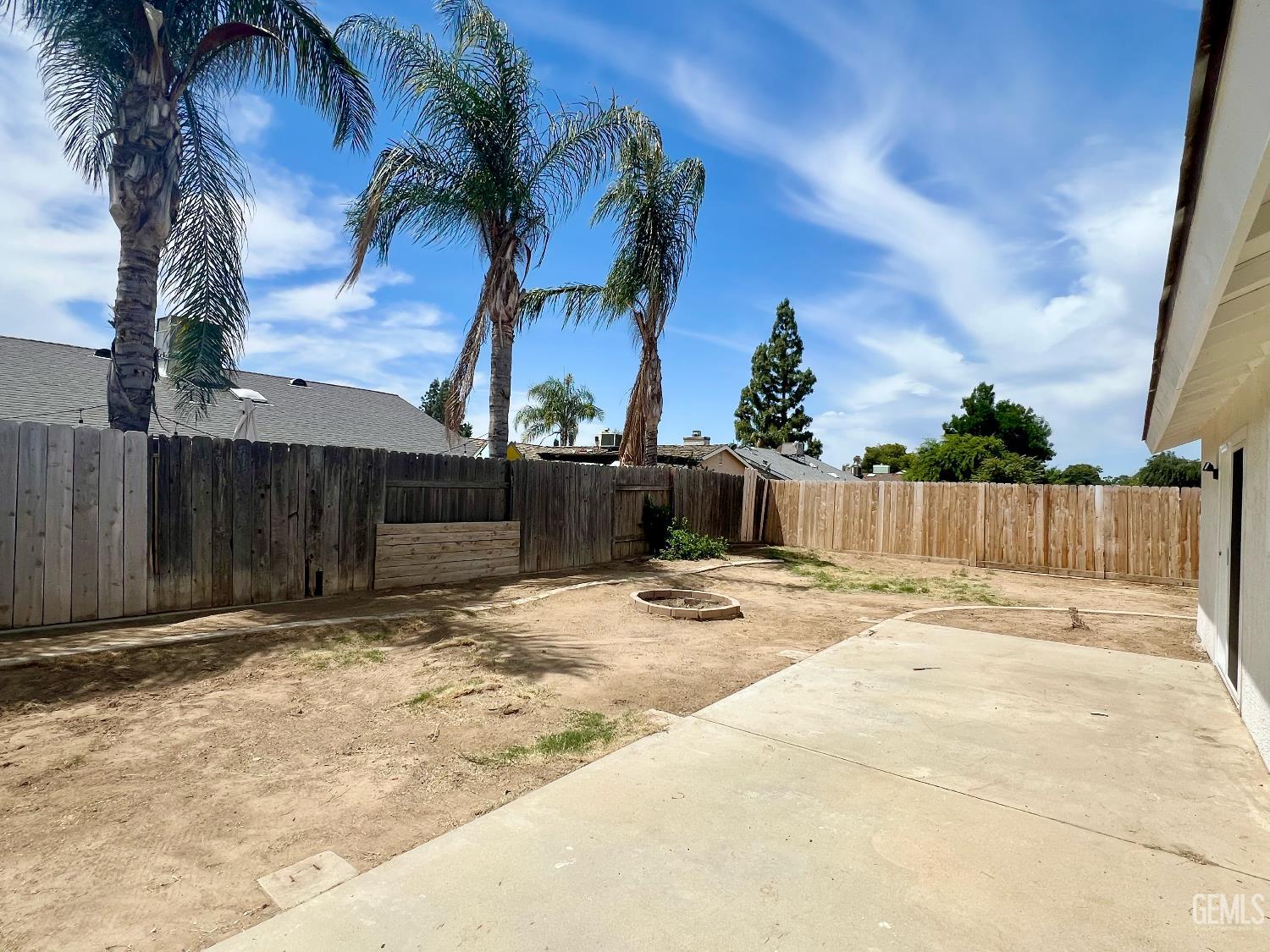 Undisclosed Address Bakersfield, CA 93308 - Photo 21 of 23 a view of a backyard of a house
