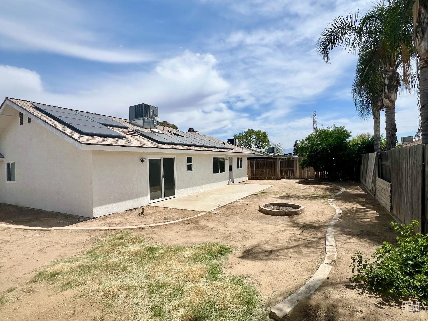 Undisclosed Address Bakersfield, CA 93308 - Photo 22 of 23 a front view of a house with a yard