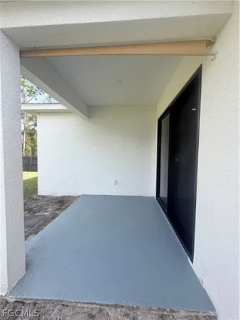 a view of a large pool with an ocean view