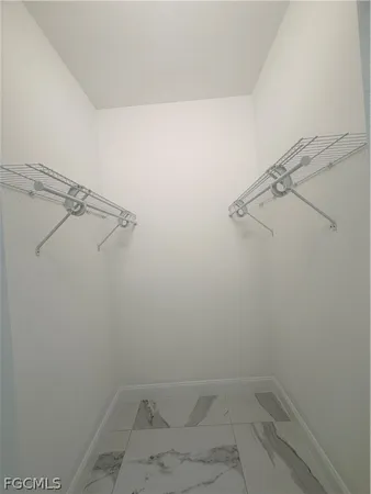 a bathroom with a shower and a toilet