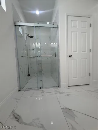 a bathroom with a sink a mirror and a vanity