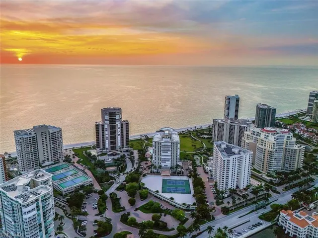 a view of city with ocean
