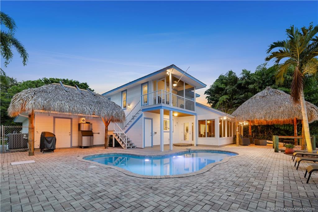a front view of a house with entertaining space