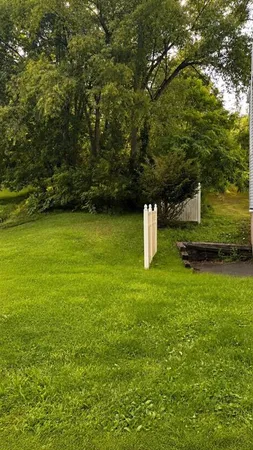 a fire hydrant in the middle of a field