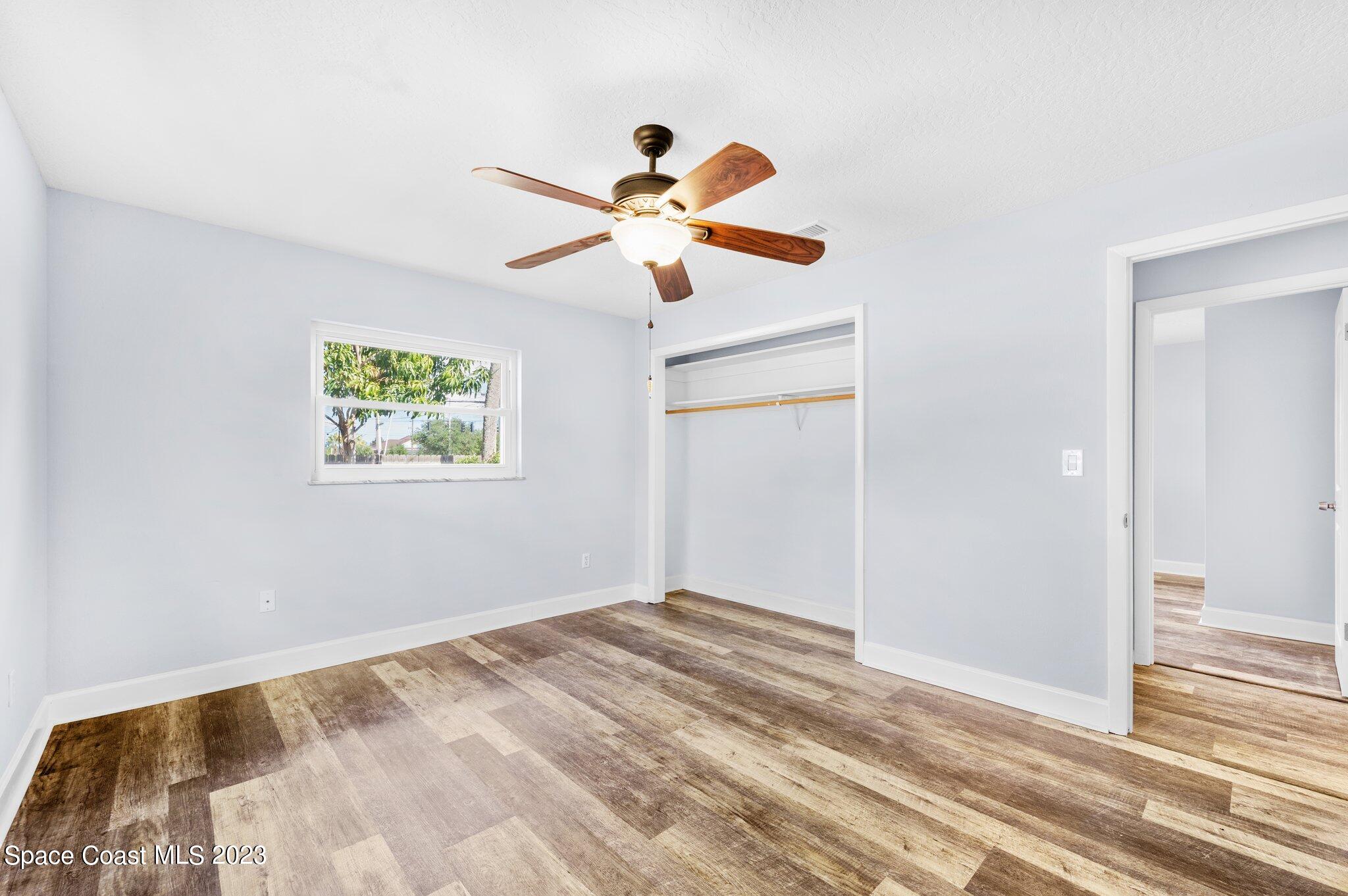 3030 Hield Road Melbourne, FL 32904 - Photo 11 of 36 a view of empty room with wooden floor