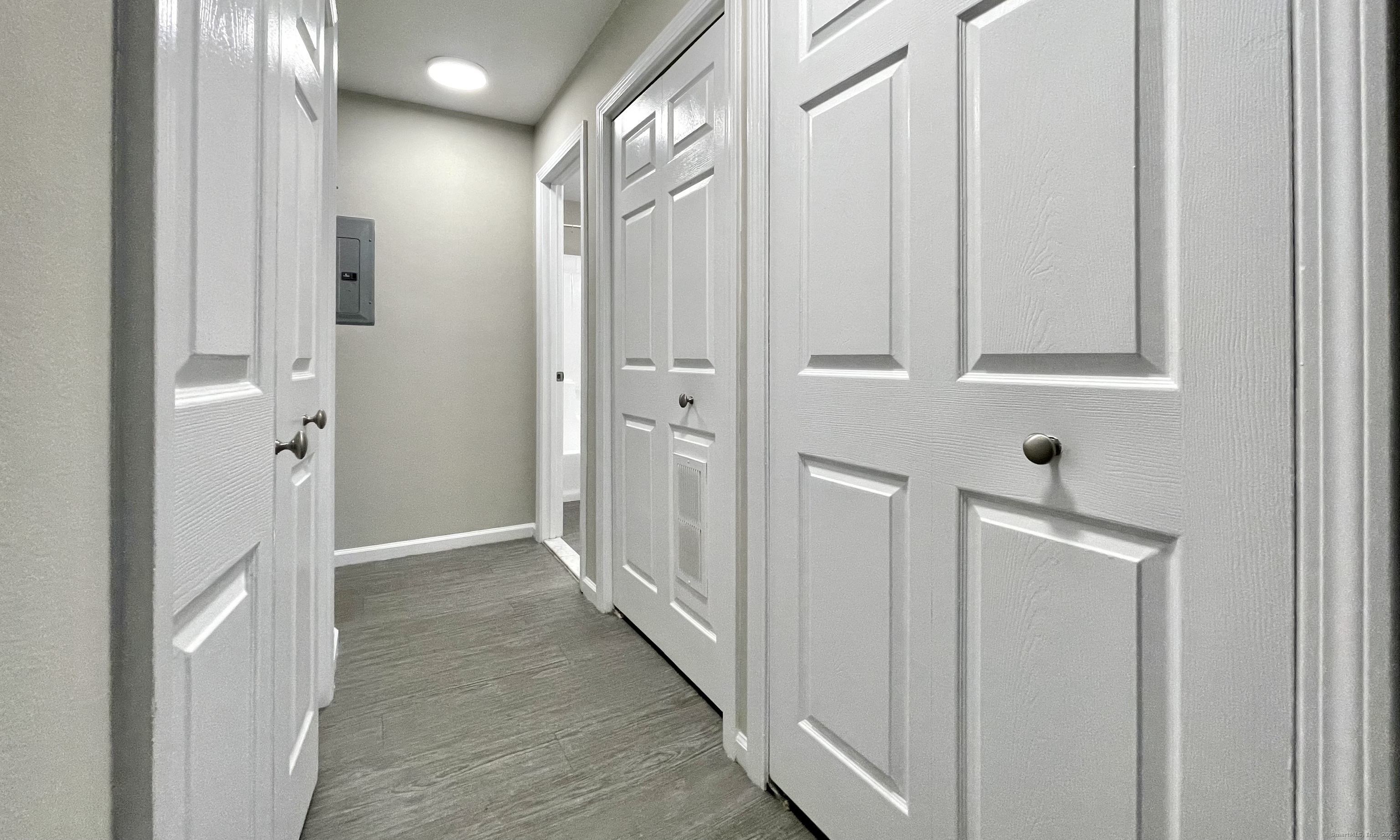 68 West Main Street Milford, CT 06460 - Photo 12 of 13 a view of a hallway with wooden floor