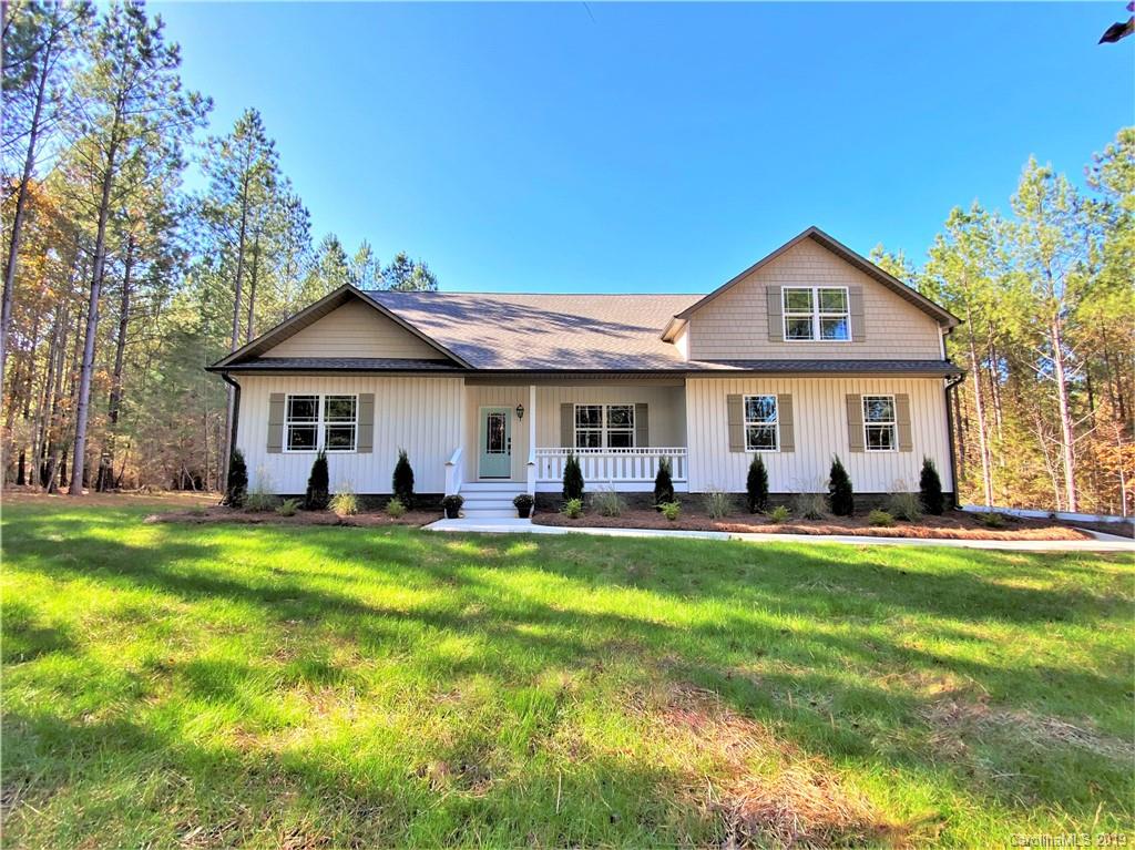 1501 Sierra Road York, SC 29745 - Photo 1 of 47 a front view of a house with a garden and porch