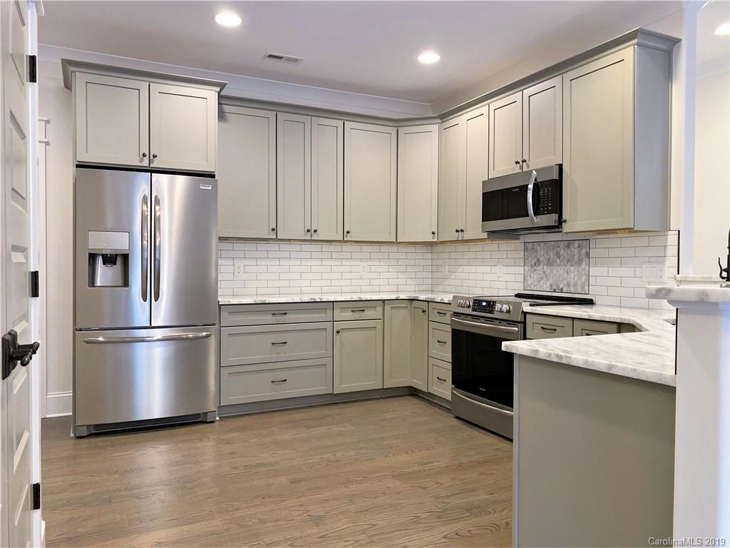 1501 Sierra Road York, SC 29745 - Photo 15 of 47 a kitchen with cabinets stainless steel appliances and a window