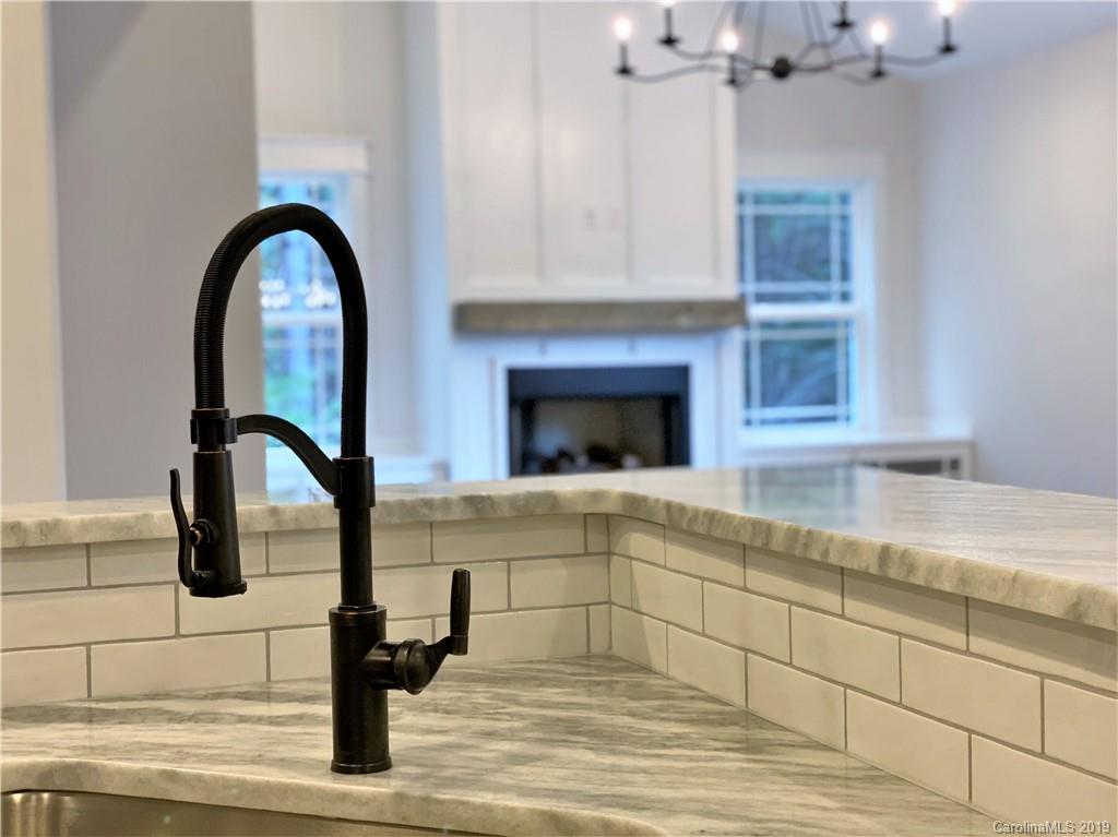 1501 Sierra Road York, SC 29745 - Photo 17 of 47 a view of granite countertop kitchen with a sink and chandelier