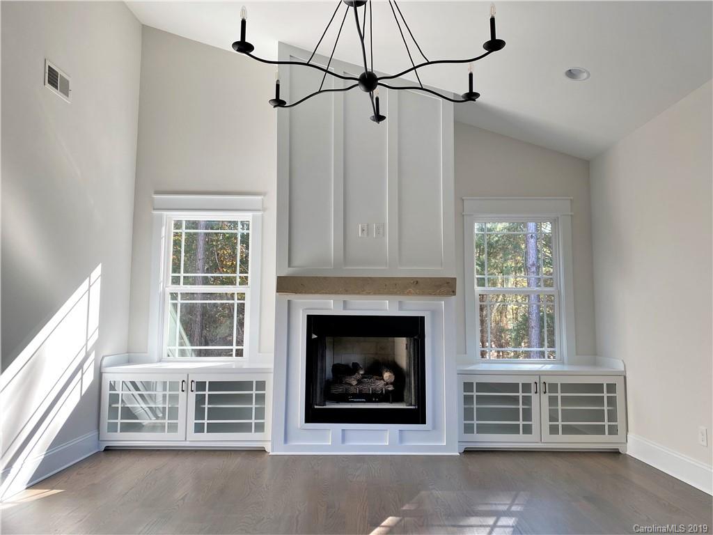 1501 Sierra Road York, SC 29745 - Photo 19 of 47 a living room with furniture a window and a fireplace
