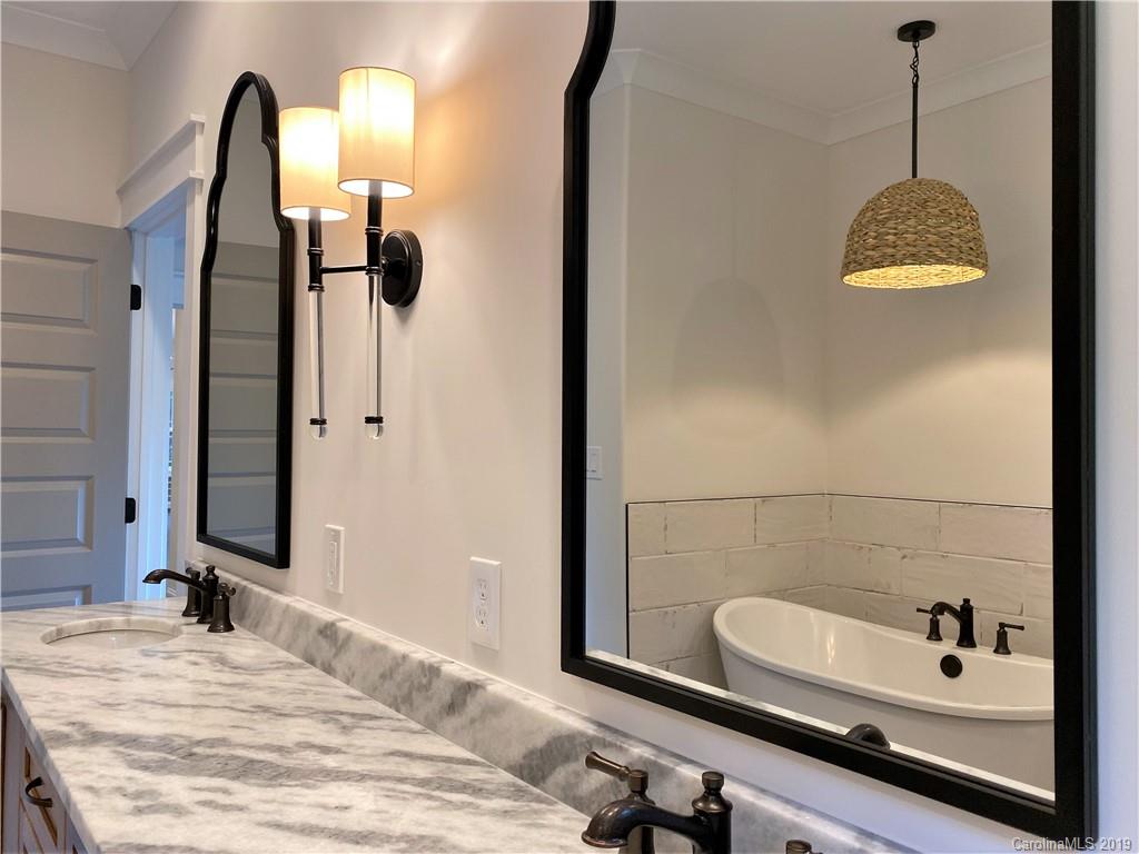 1501 Sierra Road York, SC 29745 - Photo 31 of 47 a bathroom with a sink and a mirror