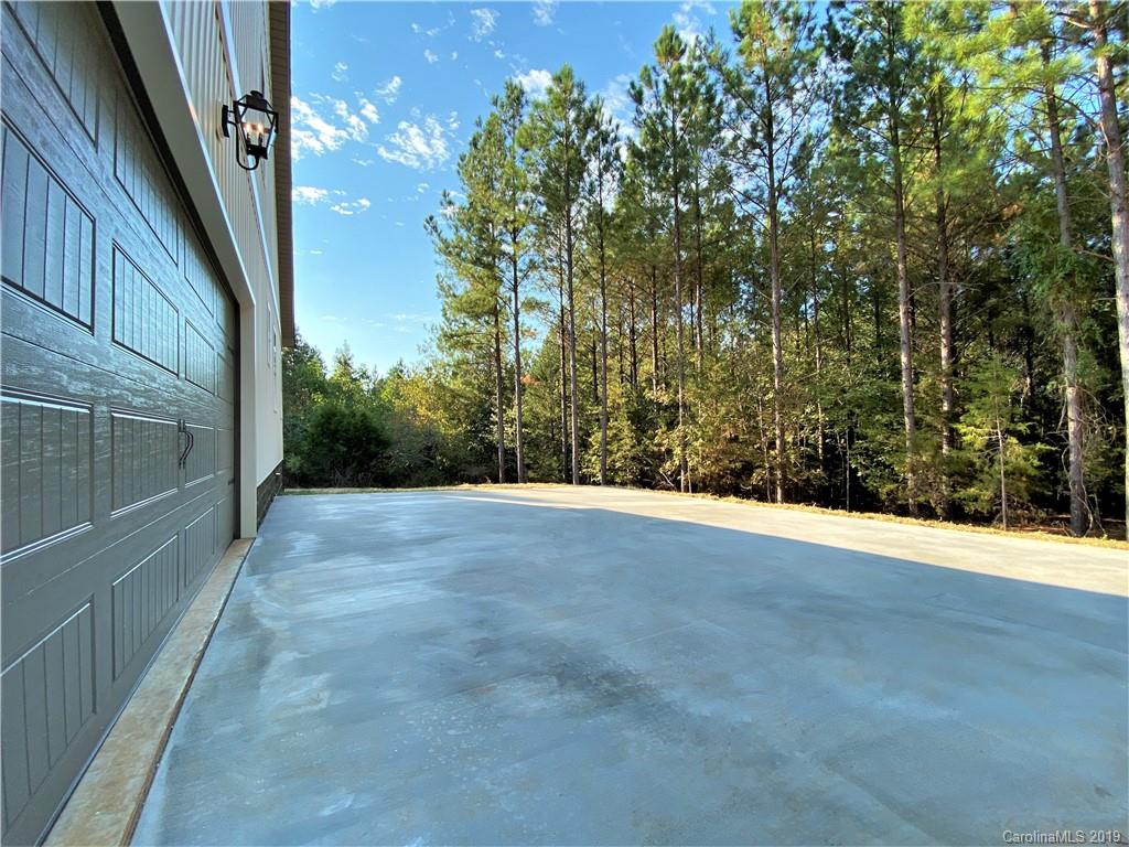 1501 Sierra Road York, SC 29745 - Photo 6 of 47 a view of a yard with an tree
