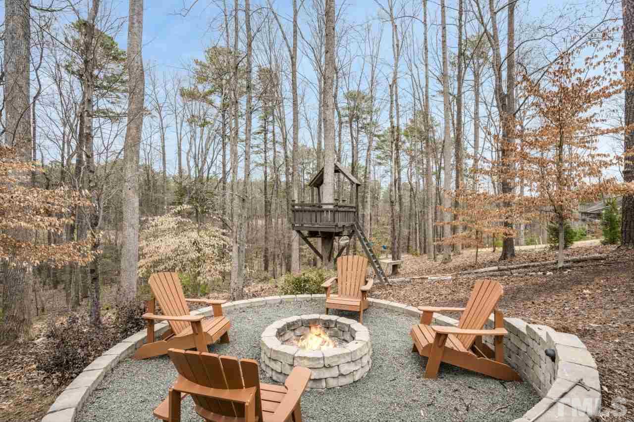 12212 Kyle Abbey Lane Raleigh, NC 27613 - Photo 2 of 30 a view of a patio with couple of chairs