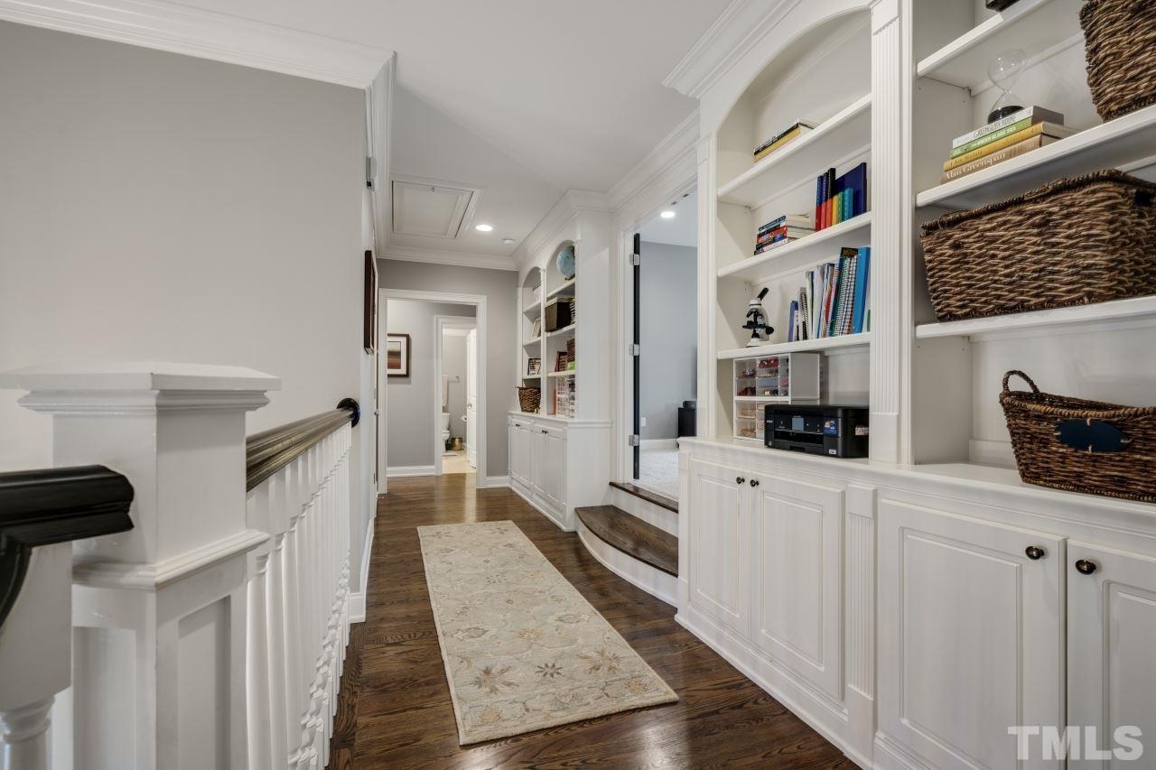 12212 Kyle Abbey Lane Raleigh, NC 27613 - Photo 26 of 30 a hallway with cabinets