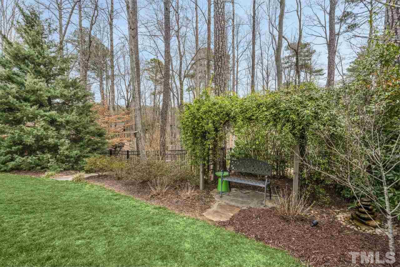 12212 Kyle Abbey Lane Raleigh, NC 27613 - Photo 30 of 30 a view of backyard with green space